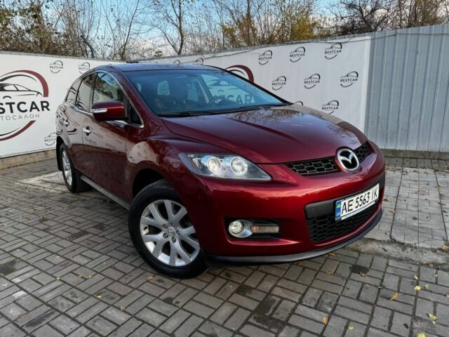 Красный Мазда СХ-7, объемом двигателя 2.3 л и пробегом 195 тыс. км за 7500 $, фото 1 на Automoto.ua