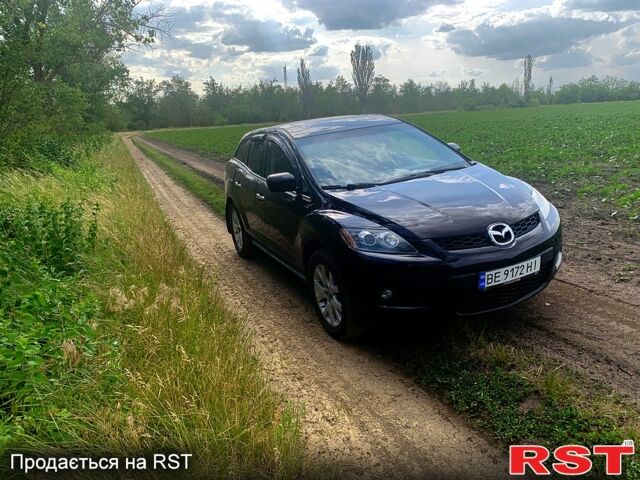 Красный Мазда СХ-7, объемом двигателя 2.3 л и пробегом 189 тыс. км за 7750 $, фото 3 на Automoto.ua