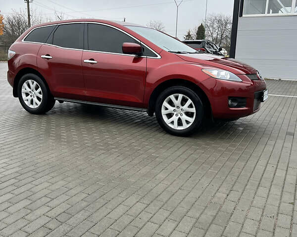 Красный Мазда СХ-7, объемом двигателя 2.26 л и пробегом 74 тыс. км за 7950 $, фото 14 на Automoto.ua