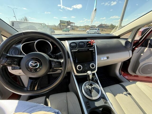 Красный Мазда СХ-7, объемом двигателя 2.3 л и пробегом 157 тыс. км за 7500 $, фото 1 на Automoto.ua