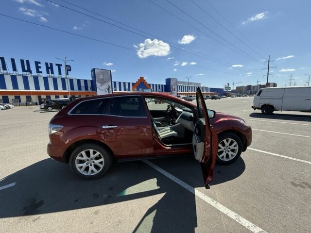 Красный Мазда СХ-7, объемом двигателя 2.3 л и пробегом 157 тыс. км за 7500 $, фото 3 на Automoto.ua