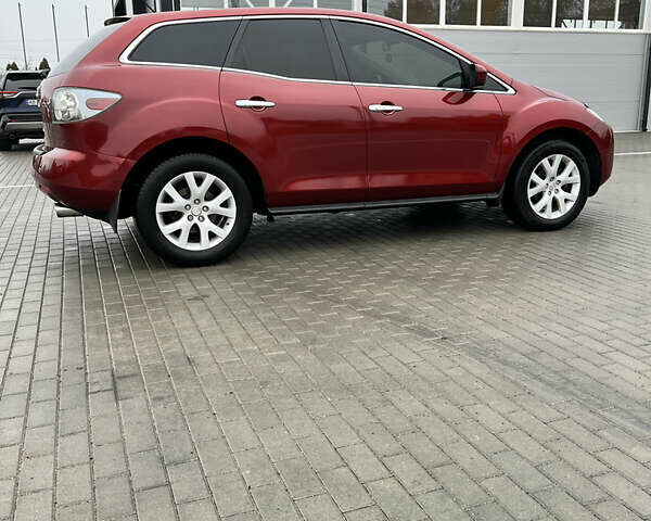 Красный Мазда СХ-7, объемом двигателя 2.26 л и пробегом 74 тыс. км за 7950 $, фото 13 на Automoto.ua