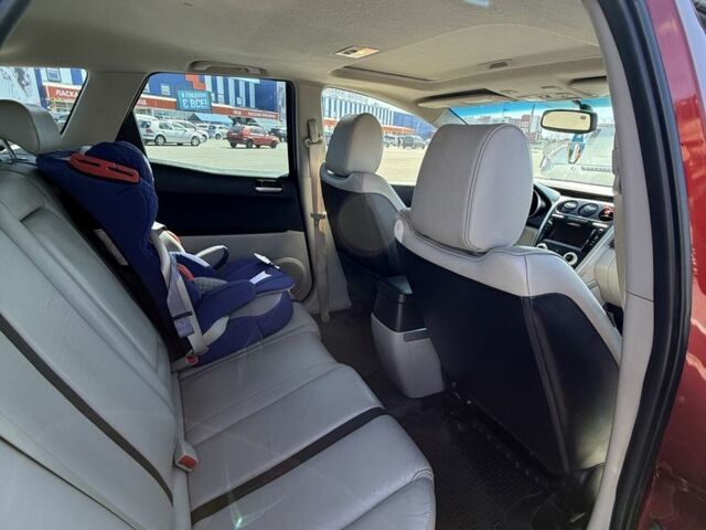 Красный Мазда СХ-7, объемом двигателя 2.3 л и пробегом 157 тыс. км за 7500 $, фото 2 на Automoto.ua