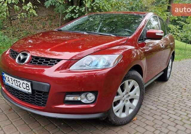 Красный Мазда СХ-7, объемом двигателя 2.26 л и пробегом 74 тыс. км за 7900 $, фото 4 на Automoto.ua