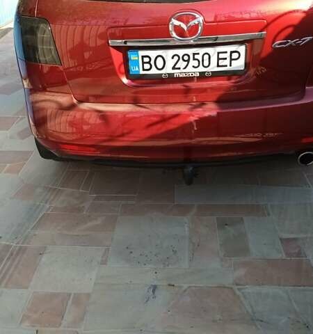 Красный Мазда СХ-7, объемом двигателя 2.2 л и пробегом 215 тыс. км за 11300 $, фото 1 на Automoto.ua