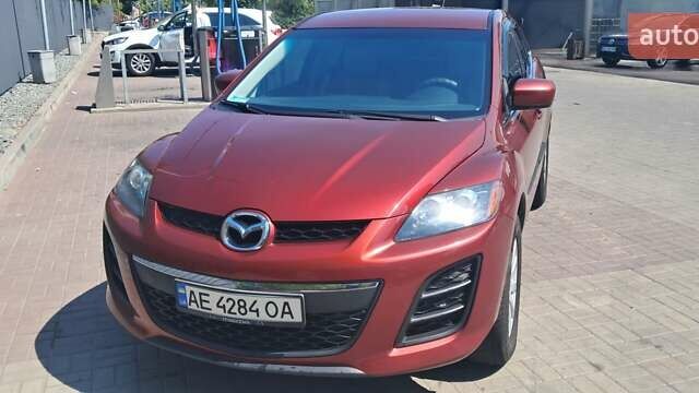 Красный Мазда СХ-7, объемом двигателя 2.49 л и пробегом 270 тыс. км за 10500 $, фото 1 на Automoto.ua