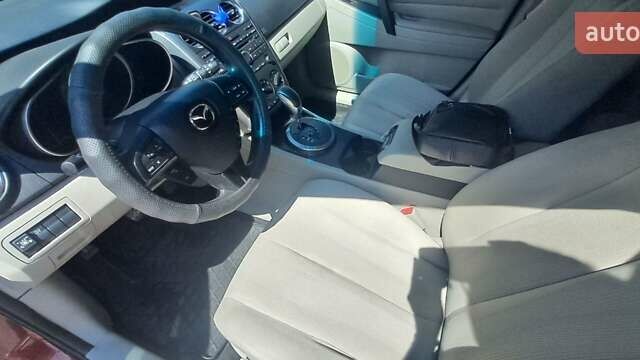 Красный Мазда СХ-7, объемом двигателя 2.49 л и пробегом 270 тыс. км за 10500 $, фото 4 на Automoto.ua