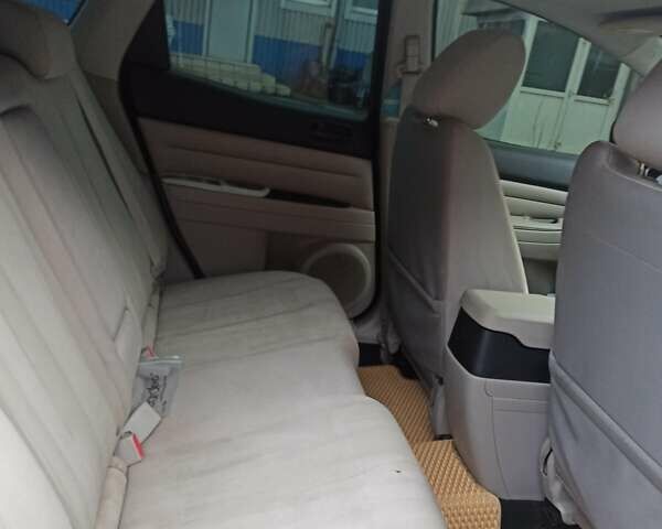 Красный Мазда СХ-7, объемом двигателя 2.49 л и пробегом 134 тыс. км за 8600 $, фото 13 на Automoto.ua