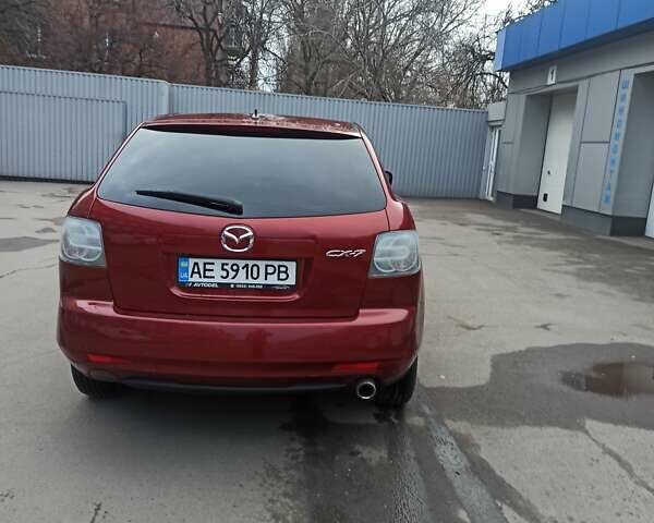 Красный Мазда СХ-7, объемом двигателя 2.49 л и пробегом 134 тыс. км за 8600 $, фото 3 на Automoto.ua
