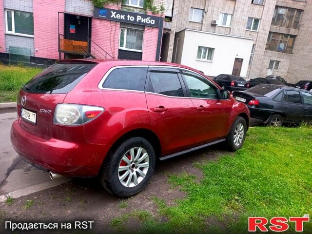 Красный Мазда СХ-7, объемом двигателя 2.5 л и пробегом 230 тыс. км за 12000 $, фото 4 на Automoto.ua