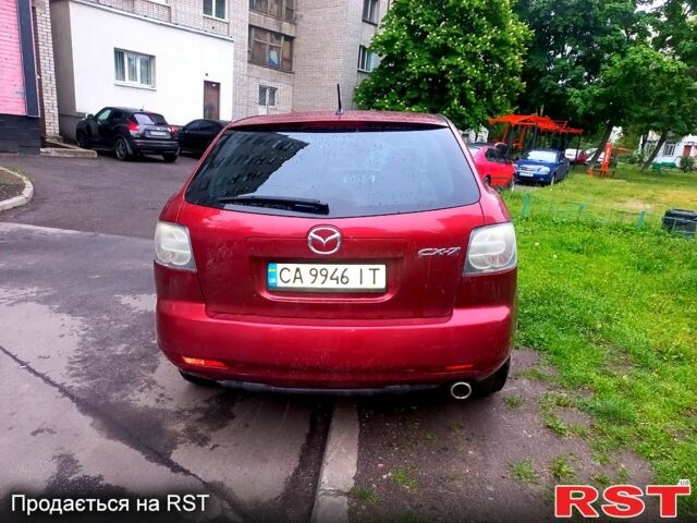 Красный Мазда СХ-7, объемом двигателя 2.5 л и пробегом 230 тыс. км за 12000 $, фото 9 на Automoto.ua