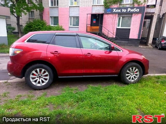 Красный Мазда СХ-7, объемом двигателя 2.5 л и пробегом 230 тыс. км за 12000 $, фото 3 на Automoto.ua