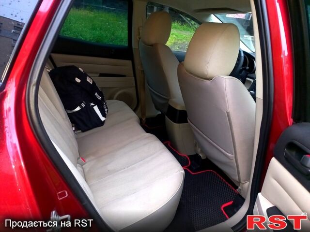 Красный Мазда СХ-7, объемом двигателя 2.5 л и пробегом 230 тыс. км за 12000 $, фото 7 на Automoto.ua