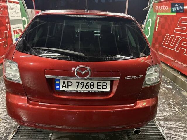Красный Мазда СХ-7, объемом двигателя 2.18 л и пробегом 230 тыс. км за 9350 $, фото 1 на Automoto.ua