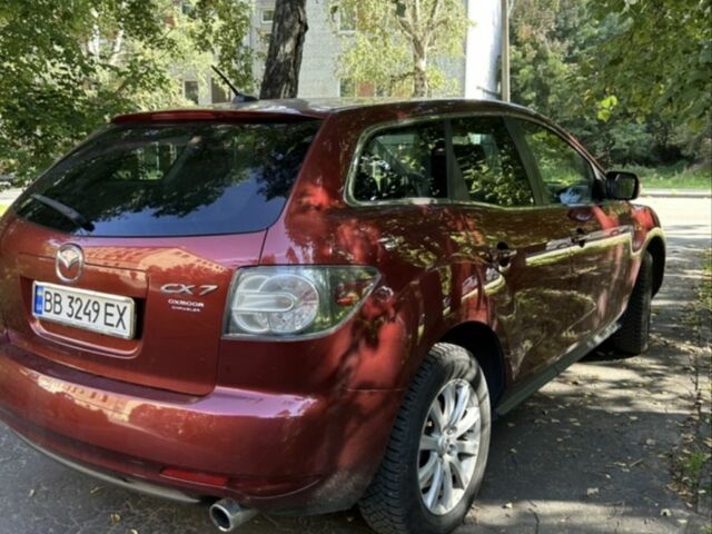 Красный Мазда СХ-7, объемом двигателя 2.5 л и пробегом 200 тыс. км за 10447 $, фото 1 на Automoto.ua