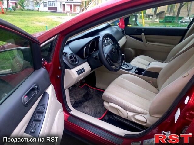 Красный Мазда СХ-7, объемом двигателя 2.5 л и пробегом 230 тыс. км за 12000 $, фото 5 на Automoto.ua