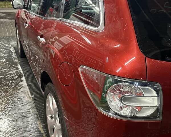 Красный Мазда СХ-7, объемом двигателя 2.18 л и пробегом 230 тыс. км за 9350 $, фото 3 на Automoto.ua