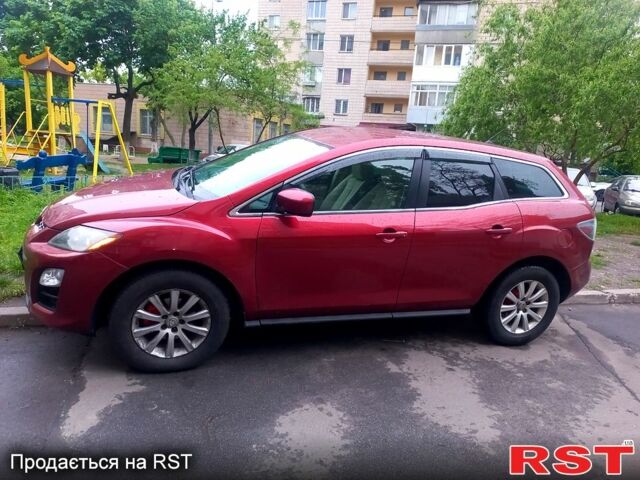 Красный Мазда СХ-7, объемом двигателя 2.5 л и пробегом 230 тыс. км за 12000 $, фото 12 на Automoto.ua