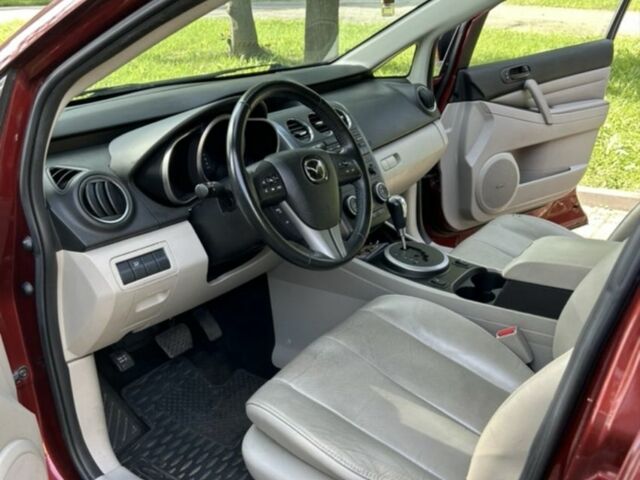 Красный Мазда СХ-7, объемом двигателя 2.5 л и пробегом 200 тыс. км за 10447 $, фото 2 на Automoto.ua