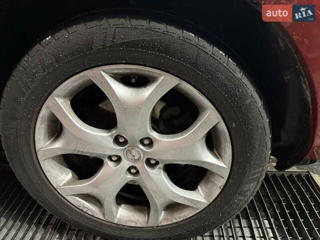 Красный Мазда СХ-7, объемом двигателя 2.18 л и пробегом 230 тыс. км за 9350 $, фото 7 на Automoto.ua