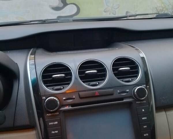 Красный Мазда СХ-7, объемом двигателя 2.26 л и пробегом 360 тыс. км за 7400 $, фото 5 на Automoto.ua