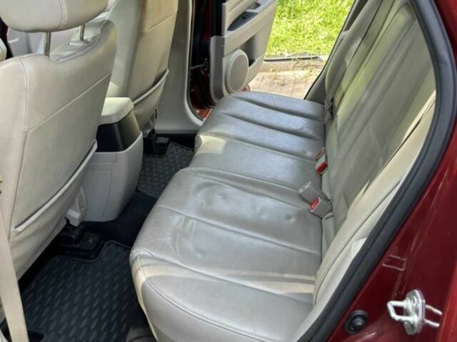 Красный Мазда СХ-7, объемом двигателя 2.5 л и пробегом 200 тыс. км за 10496 $, фото 3 на Automoto.ua