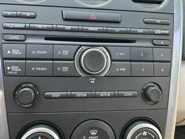 Красный Мазда СХ-7, объемом двигателя 2.5 л и пробегом 200 тыс. км за 10496 $, фото 13 на Automoto.ua