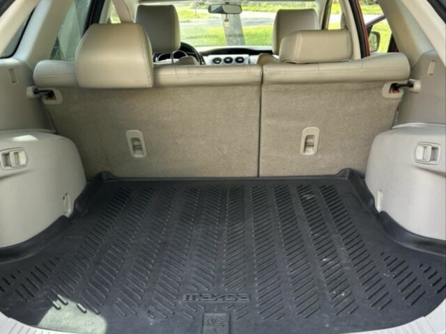 Красный Мазда СХ-7, объемом двигателя 2.5 л и пробегом 200 тыс. км за 10447 $, фото 9 на Automoto.ua