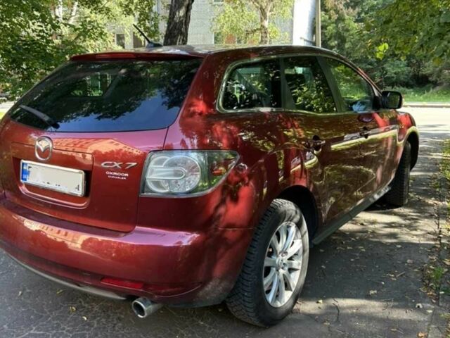 Красный Мазда СХ-7, объемом двигателя 2.5 л и пробегом 200 тыс. км за 10496 $, фото 1 на Automoto.ua