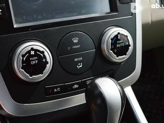 Мазда СХ-7, объемом двигателя 2.3 л и пробегом 159 тыс. км за 7700 $, фото 27 на Automoto.ua