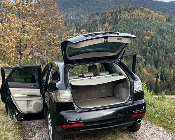 Мазда СХ-7, объемом двигателя 2.18 л и пробегом 265 тыс. км за 8550 $, фото 4 на Automoto.ua
