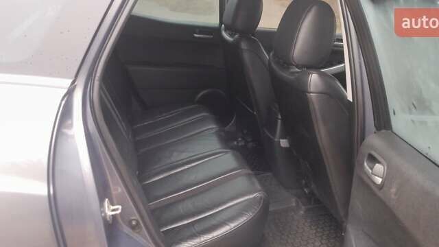 Серый Мазда СХ-7, объемом двигателя 2.26 л и пробегом 276 тыс. км за 6600 $, фото 12 на Automoto.ua