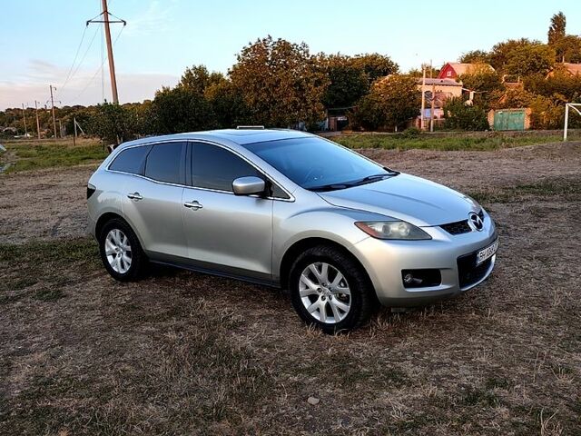 Серый Мазда СХ-7, объемом двигателя 2.3 л и пробегом 125 тыс. км за 5500 $, фото 1 на Automoto.ua