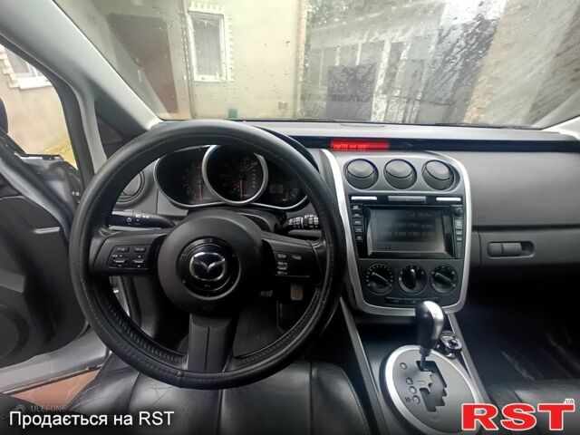 Серый Мазда СХ-7, объемом двигателя 2.3 л и пробегом 99 тыс. км за 6000 $, фото 4 на Automoto.ua