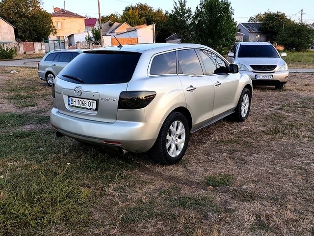 Серый Мазда СХ-7, объемом двигателя 2.3 л и пробегом 125 тыс. км за 5500 $, фото 2 на Automoto.ua