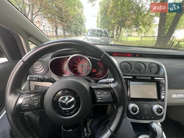 Серый Мазда СХ-7, объемом двигателя 2.3 л и пробегом 150 тыс. км за 7000 $, фото 1 на Automoto.ua