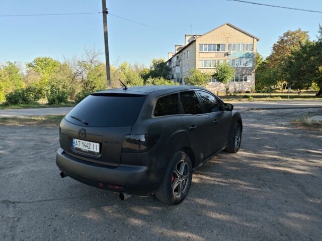 Серый Мазда СХ-7, объемом двигателя 2.3 л и пробегом 178 тыс. км за 6500 $, фото 3 на Automoto.ua