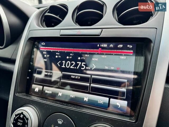 Сірий Мазда СХ-7, об'ємом двигуна 2.3 л та пробігом 147 тис. км за 5999 $, фото 49 на Automoto.ua