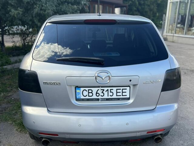 Серый Мазда СХ-7, объемом двигателя 2.3 л и пробегом 255 тыс. км за 6200 $, фото 1 на Automoto.ua