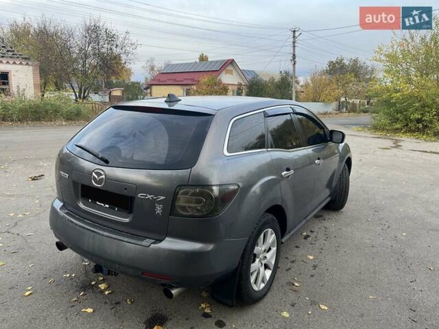 Серый Мазда СХ-7, объемом двигателя 2.3 л и пробегом 185 тыс. км за 6000 $, фото 3 на Automoto.ua