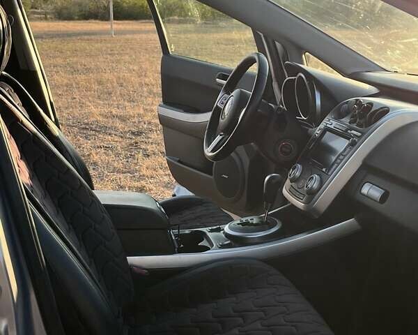 Серый Мазда СХ-7, объемом двигателя 2.3 л и пробегом 165 тыс. км за 6300 $, фото 1 на Automoto.ua