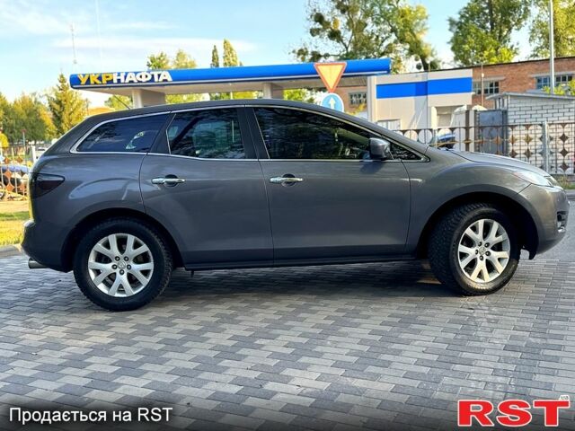 Серый Мазда СХ-7, объемом двигателя 2.3 л и пробегом 185 тыс. км за 6800 $, фото 3 на Automoto.ua
