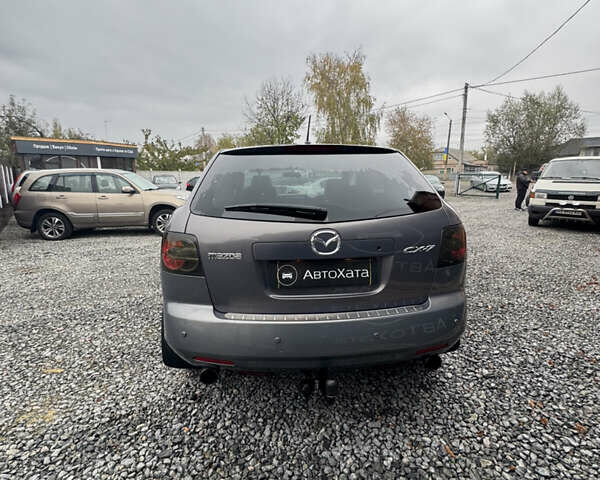 Серый Мазда СХ-7, объемом двигателя 2.26 л и пробегом 163 тыс. км за 7600 $, фото 4 на Automoto.ua