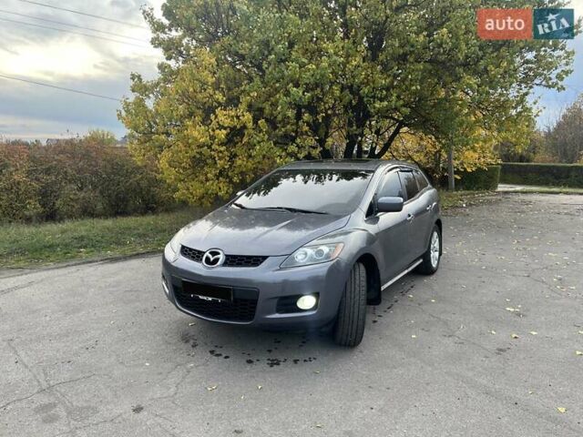 Серый Мазда СХ-7, объемом двигателя 2.3 л и пробегом 185 тыс. км за 6000 $, фото 1 на Automoto.ua