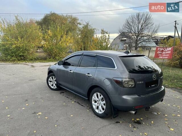 Серый Мазда СХ-7, объемом двигателя 2.3 л и пробегом 185 тыс. км за 6000 $, фото 2 на Automoto.ua