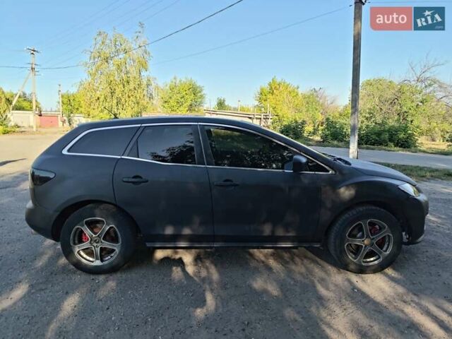 Серый Мазда СХ-7, объемом двигателя 2.3 л и пробегом 270 тыс. км за 6500 $, фото 2 на Automoto.ua