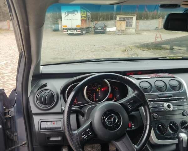 Серый Мазда СХ-7, объемом двигателя 2.3 л и пробегом 230 тыс. км за 7777 $, фото 7 на Automoto.ua