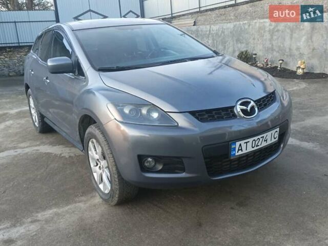 Серый Мазда СХ-7, объемом двигателя 2.26 л и пробегом 240 тыс. км за 5800 $, фото 3 на Automoto.ua