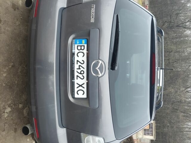 Серый Мазда СХ-7, объемом двигателя 2.3 л и пробегом 235 тыс. км за 7777 $, фото 2 на Automoto.ua