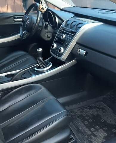 Серый Мазда СХ-7, объемом двигателя 2.26 л и пробегом 190 тыс. км за 7000 $, фото 1 на Automoto.ua